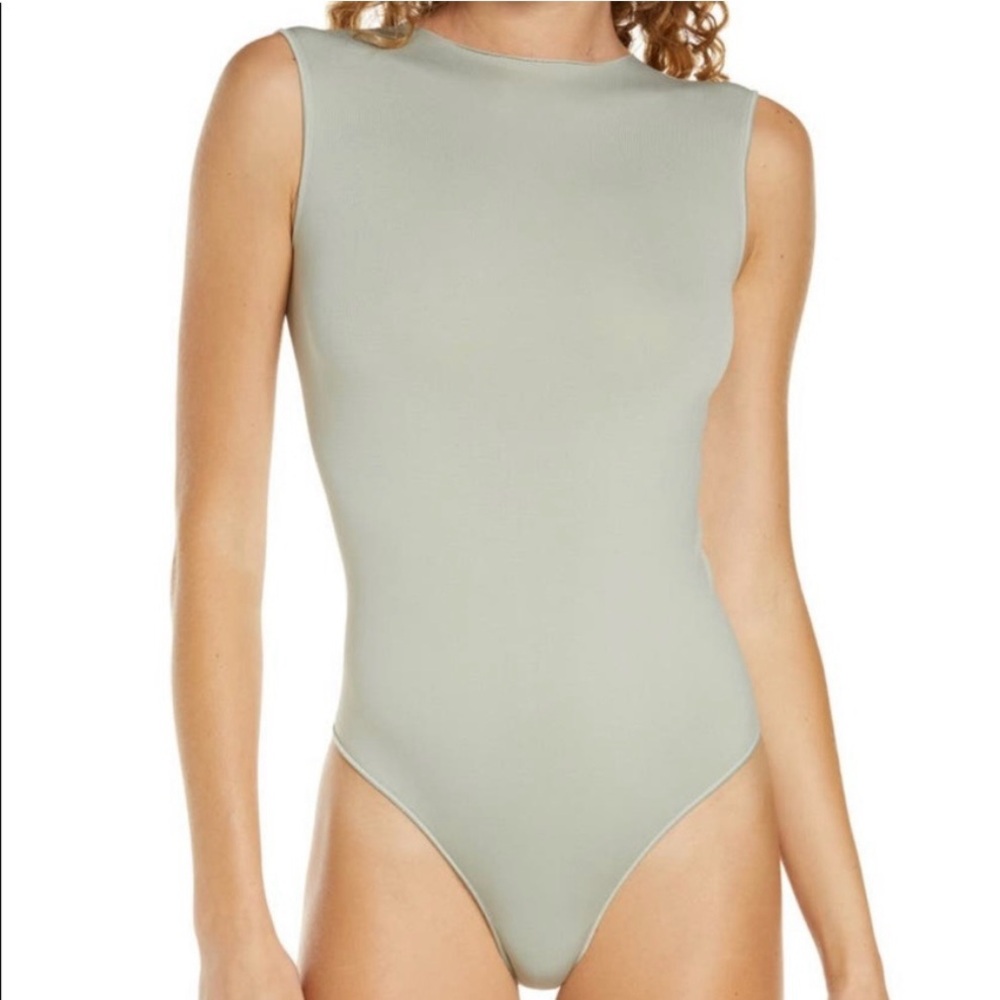 Skims Essential Crew Neck Sleeveless Bodysuit in “Agave” (Light Sage)